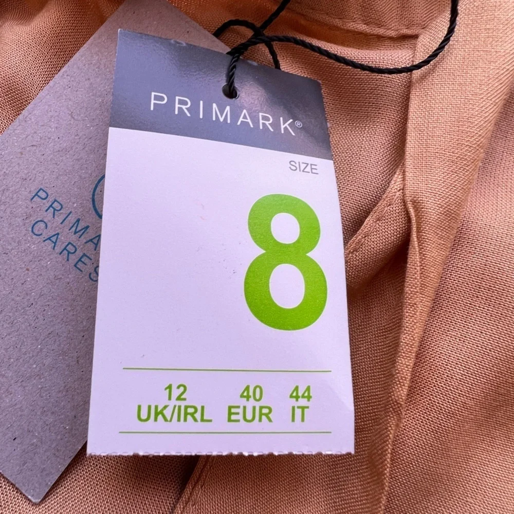 Dress shorts, yellow size 8 . PRIMARK CARES
